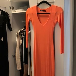 Like new, deep-v, mid calf, naked wardrobe snatched dress